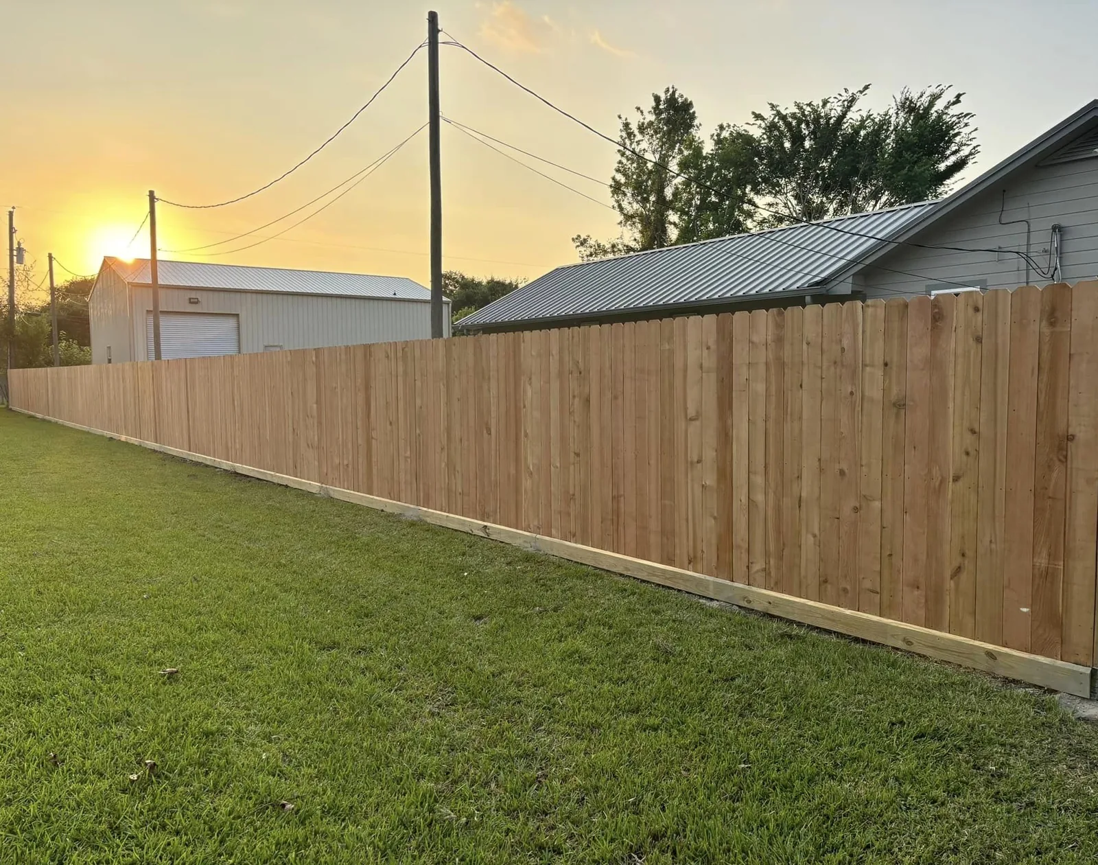 Cedar privacy fence with galvanized steel posts installed near San Leon, Texas