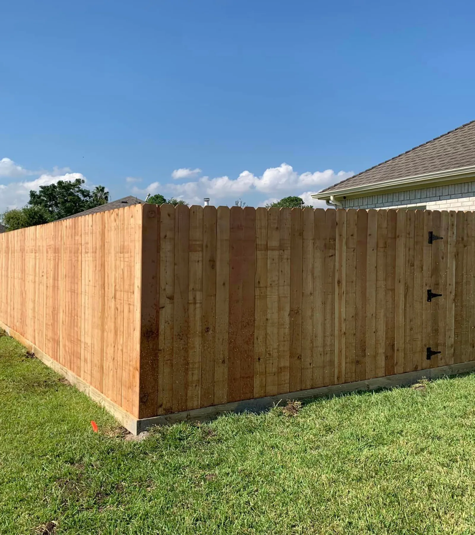 Standard Fence crew installing a coastal-rated fence line on Galveston Bay