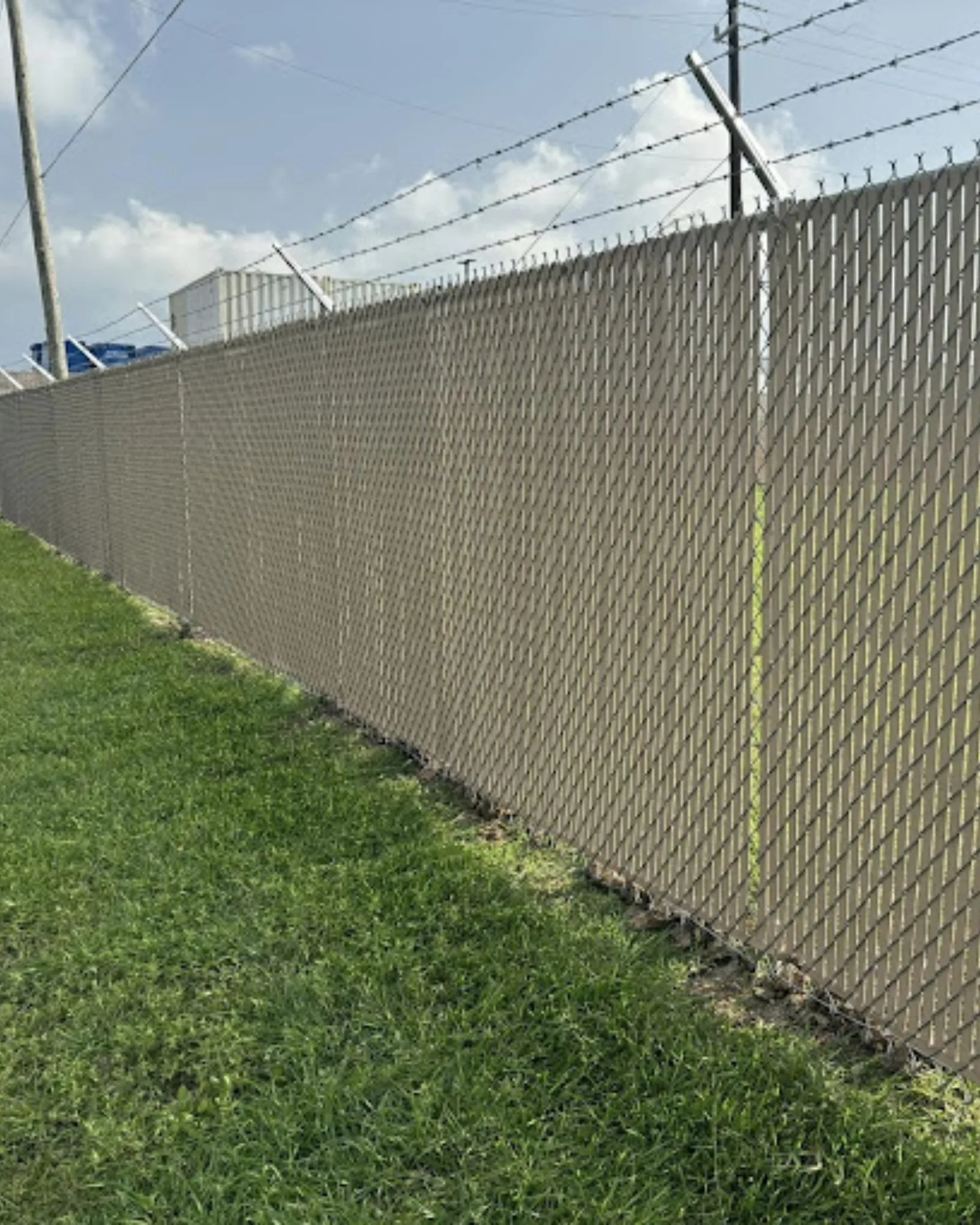 Freshly stained cedar privacy fence near San Leon, Texas